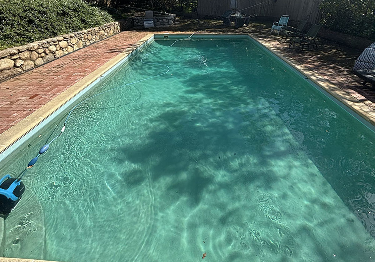 Clear pool with mountain views serviced by Perfectly Balanced Pool & Spa